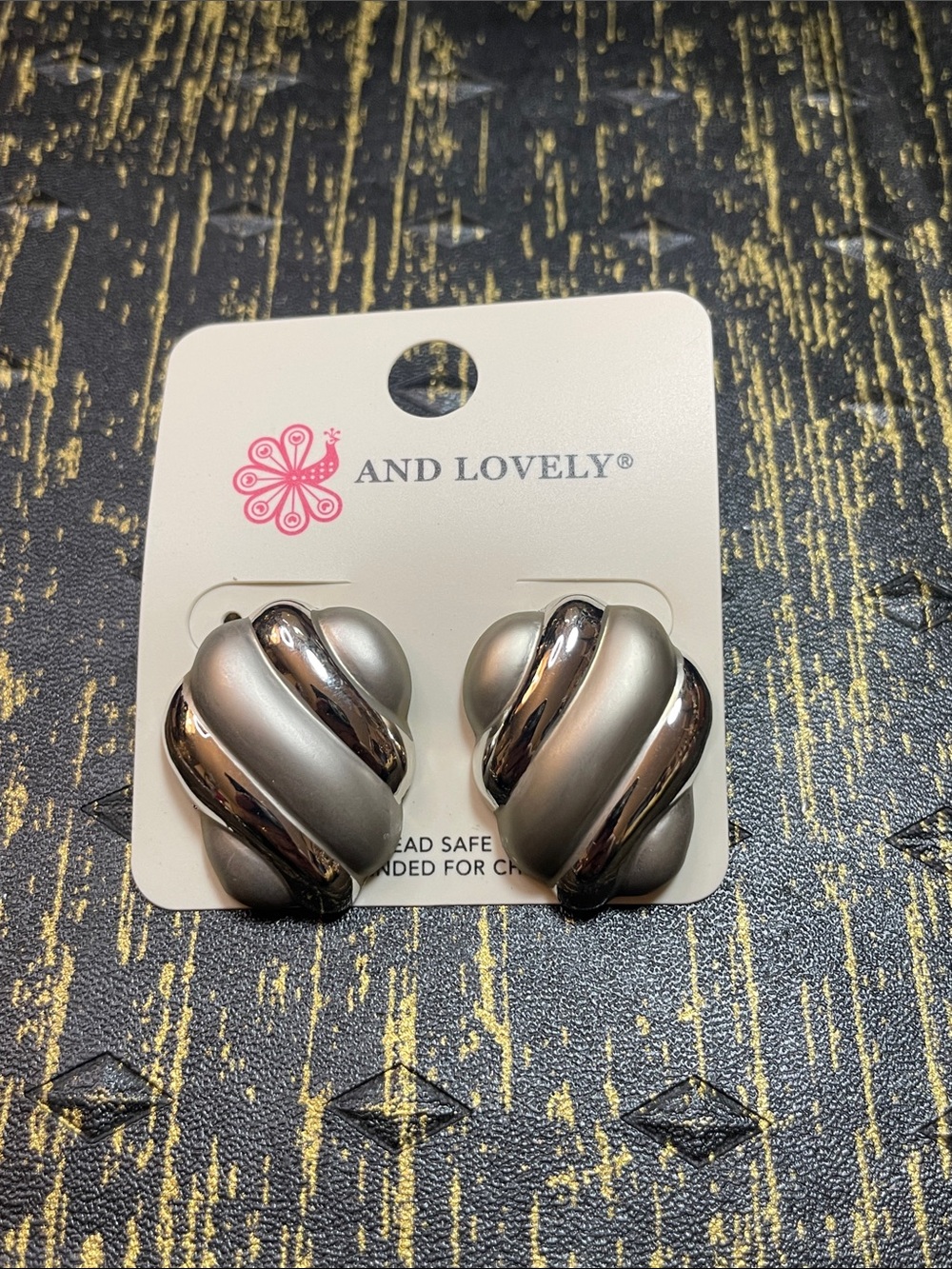 And Lovely Silver-Tone Twisted Pierced Earrings